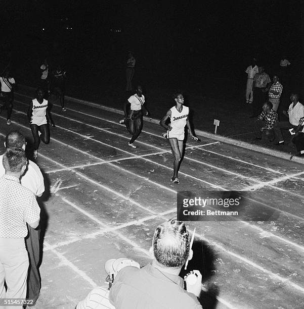 Wilma Rudolph, 19 year-old junior at the University of Tennessee breaks the string and a new world's record 7/9 is the 200 meter run with a time of...