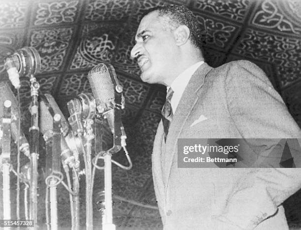 Colonel Gamal Abdel Nasser, Prime Minister of Egypt, is shown as he proclaimed the new Egyptian constitution in Republic Square in Cairo. It will be...