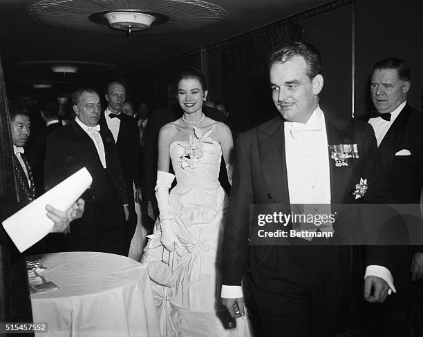 Grace and Her Prince Arrive for "Night in Monte Carlo." New York, New York: Arriving for the "Night in Monte Carlo" Ball at the Waldorf-Astoria Hotel...