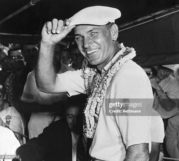 National Open champ Ben Hogan is shown as he donned the victory lei after winning his fourth National Open title with five-under-par 283 for 72...