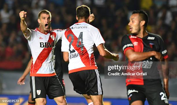 Emanuel Mammana of River Plate celebrates with Ivan Alonso after scoring the opening goal during a match between Colon and River Plate as part of...