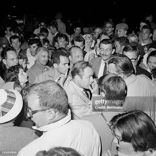 Actor Marlon Brando joins with and speaks to demonstrators against capital punishment outside the gates of San Quentin prison. Hundreds of persons,...