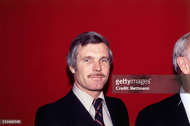Avid sports fan and media mogul Ted Turner, who would go on to launch CNN and the Turner Network Television, gives a youthful smile.