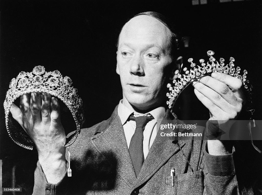 Man Holding Two Tiaras