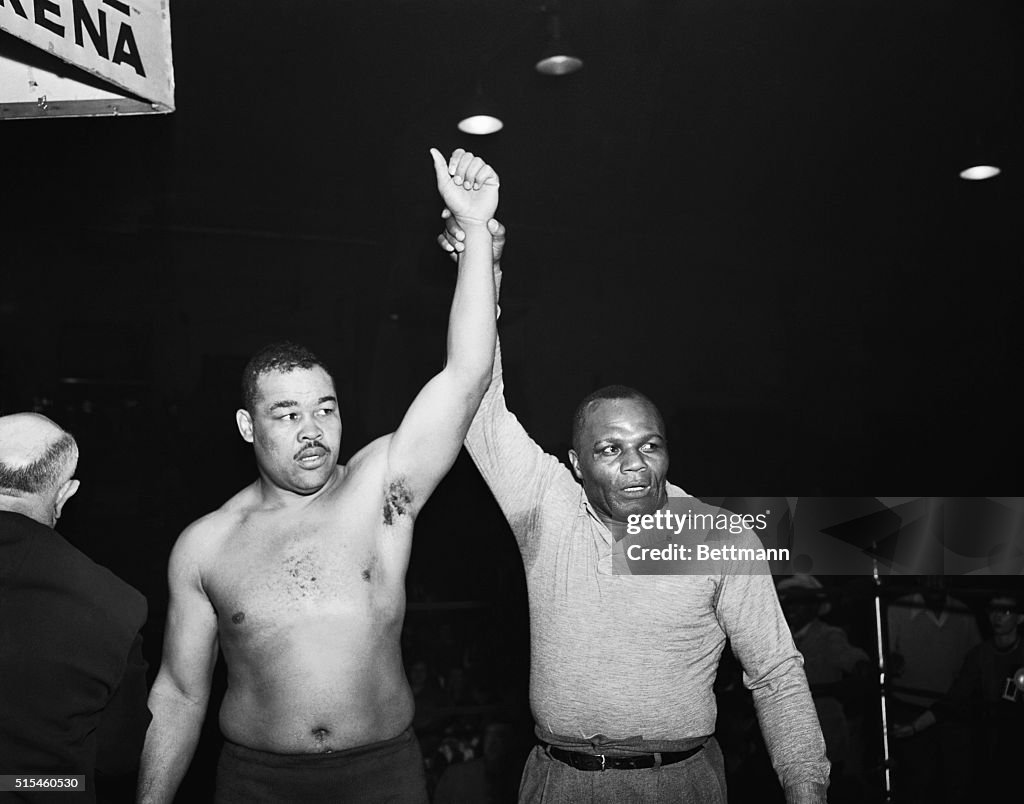 Joe Walcott Holding Up the Arm of Joe Louis