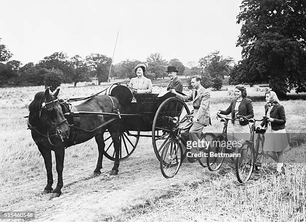 King George VI and Queen Elizabeth out Riding with The Princesses