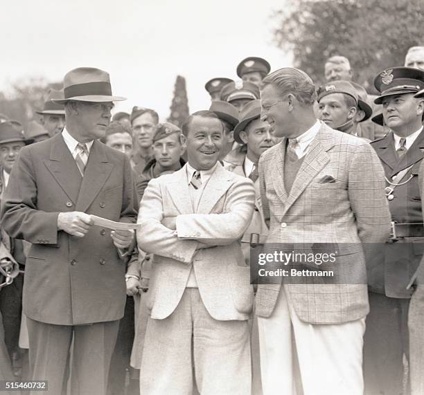 Winner And Runner-Up In Masters' Tourney, Get Checks. Augusta, Georgia: Left to right, Grantland Rice, renowned sports writer, presenting their...