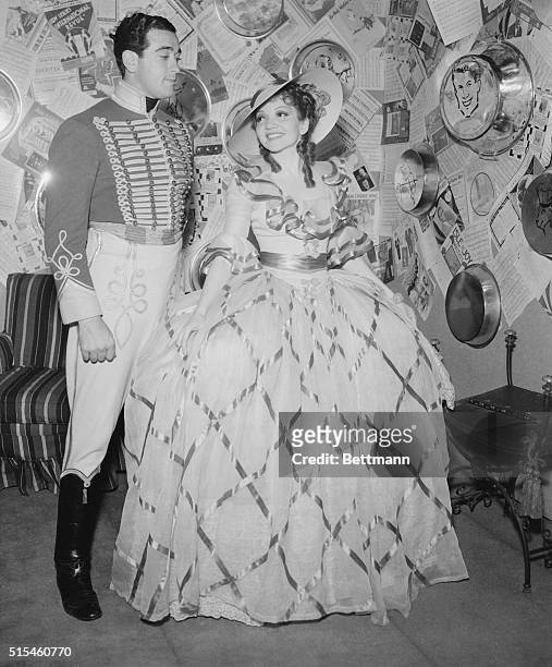 Pat DeCicco and Claudette Colbert well known in the movie colony pictured when they attended the Costume Party given here by Carl Laemlle Jr....