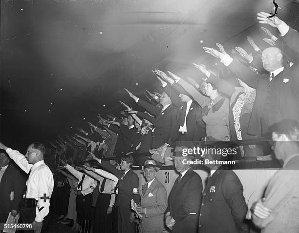 Nazi Salute at Garden Protest Meeting. The Nazi salute is given with the proper snap, by these Nazi sympathizers who gathered at Madison Square...