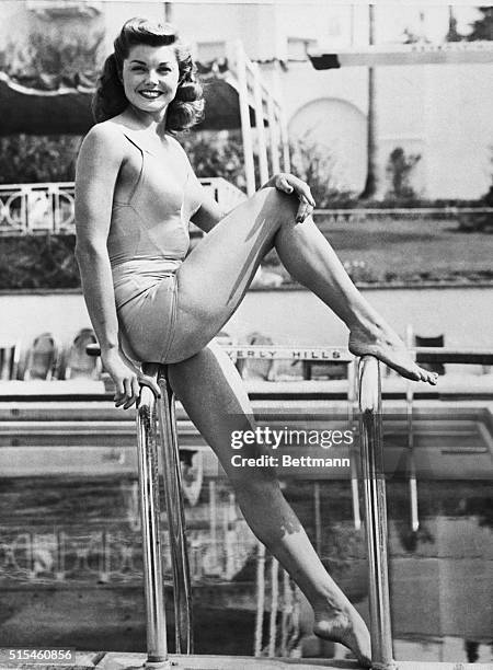 Triple Threat. Beverly Hills, Calif.: Looking pretty is the easiest thing Esther Williams does. She's also a top notch swimmer, as well as a MGM...