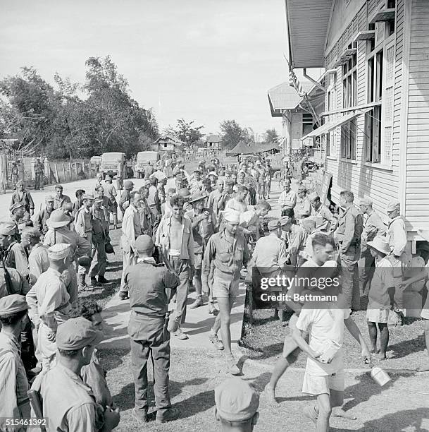 Cabanatuan Prisoners Liberated. Luzon, The Philippines: Their ragged clothes hanging from emaciated bodies, Allies rescued from the Jap prison camp...