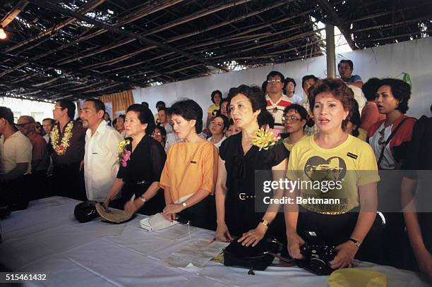 Batangas City, The Philippines: Corazon Aquino stands , during ceremony. | Location: Batangas City, The Philippines.