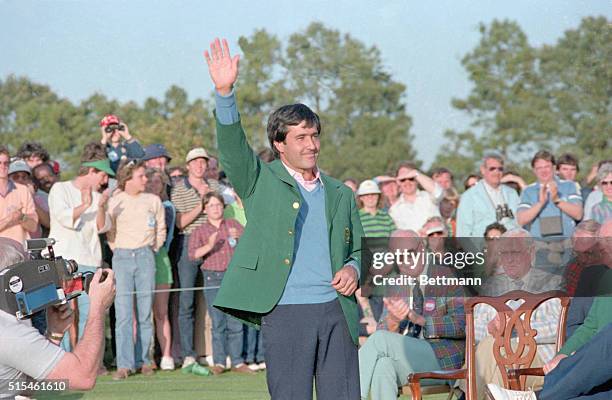 Golf pro Seve Ballesteros waves after winning the 1983 Masters Championship at the Augusta Golf Course. He is wearing the coveted Green Jacket.