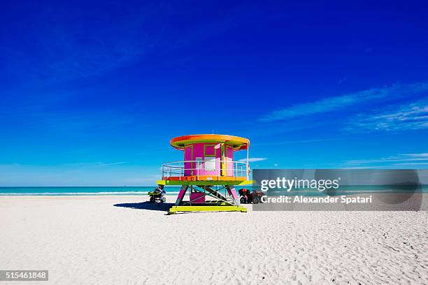 lifeguard tower on a sunny day in south beach, miami, florida, usa - miami art deco stock pictures, royalty-free photos & images