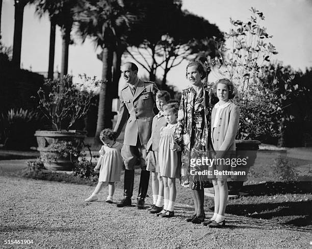 Rome: Italy's New King And Family. King Umberto II is pictured with his family in the Royal Palace Gardens following his ascendancy to the throne...