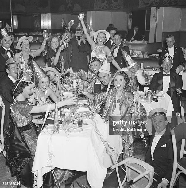 New York, NY- As Father time swung his scythe and chopped 1936 into oblivion, the New Year to came to the Bowery to be greeted by a toast from these...