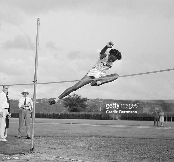 Alice Coachman of the Tuskegee Institute Club is seen as she wins the high jump event at the National Women's Track and Field meet.