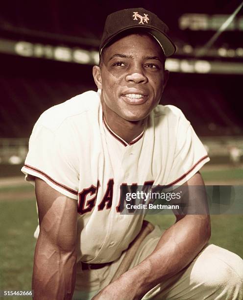 Willie Mays of the New York Giants is shown here in this three-quarters length photo on one knee.