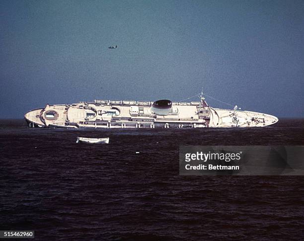 Italian ocean liner Andrea Doria sinking after a collision with the Swedish ocean liner Stockholm off Cape Cod.