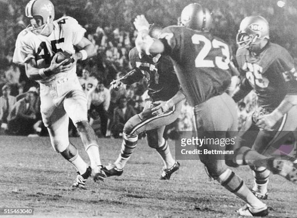 University of Florida's receiver Carlos Alvarez catches a pass for Florida's 2nd TD with the University of Miami's Dean Stone and Bill Majewski...