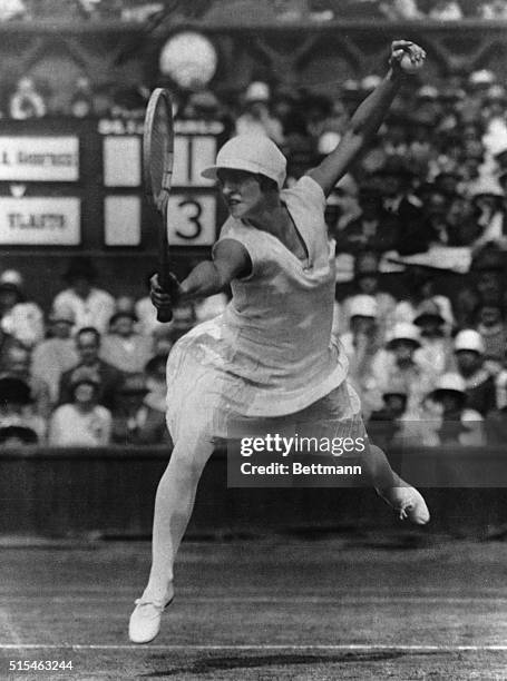 The semifinals of the Women's Singles in the Wimbledon Lawn Tennis Championships were played. Mademoiselle D. Vlasto in play against Mrs. Godfree .