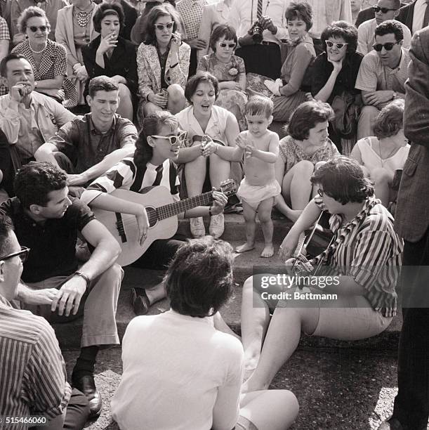 New York, NY: Folk musicians playing in Washington Square Park. Photo, May 15, 1961.