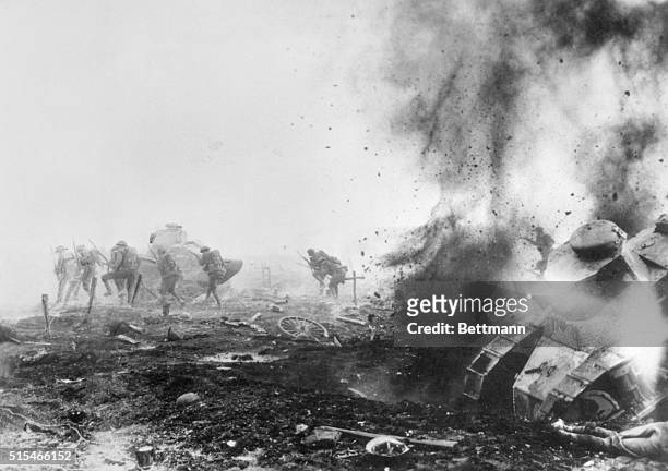 Hell breaks loose in Flanders... One of the most graphic of all war pictures. This photograph of actual combat shows a British tank being wrecked by...