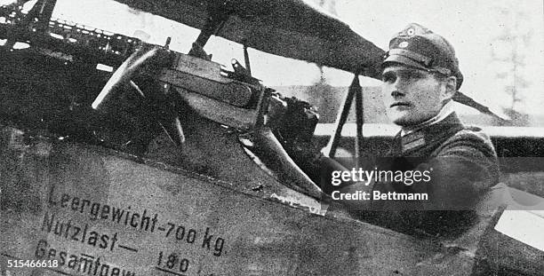 Leutnant Rudolf Hess sits in the cockpit of his Fokker D.VII biplane fighter from Bayerische Jagdstaffel 35 of the Luftstreitkräfte, the air arm of...