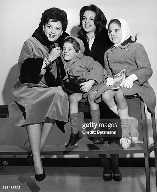 New York: Judy Garland pictured in New York on arrival with her family, from London, en route to Miami where she will earn an all time record salary...
