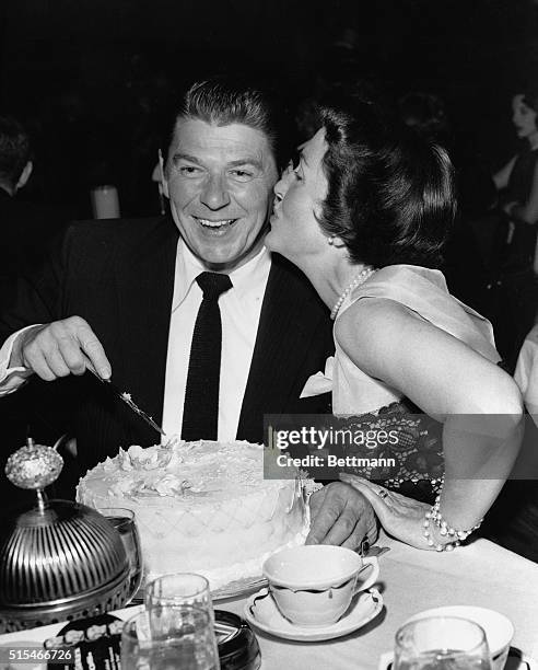 Ronald Reagan gets a buzz and a "happy birthday" from his lovely wife. Ronnie remains one of Hollywood's best liked actors and has the reputation of...