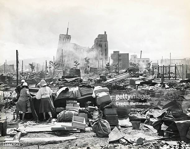 Japanese set about to salvage whatever household goods they can in an effort to begin the long hard task of reconstruction in Fukui, hardest hit by...