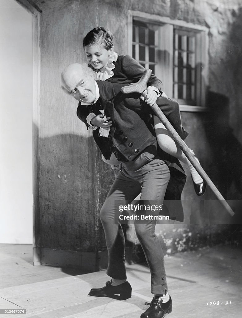 Reginald Owen Carrying Terry Kilburn on His Back