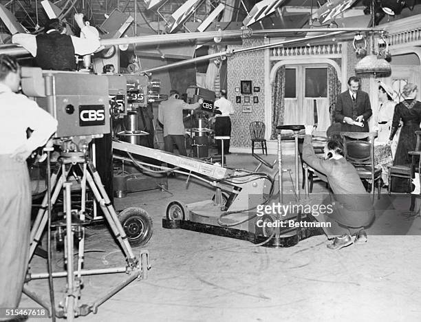 New York, NY: Overall shot of CBS-TV studio in New York showing technical facilities. Four cameras are in operation. Fluorescent light banks are...