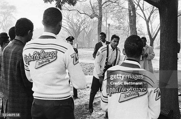 Photo shows members of Alpha Phi Omega Service fraternity of Howard University, as they engage in "hijinks" on the university campus.