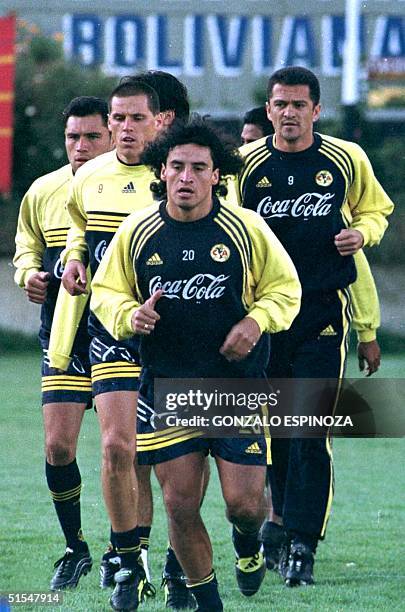 Chilean soccer player Fabian Estay leads his teammates during training in La Paz, Bolivia, 23 May 2000. AFP PHOTO / Gonzalo ESPINOZA