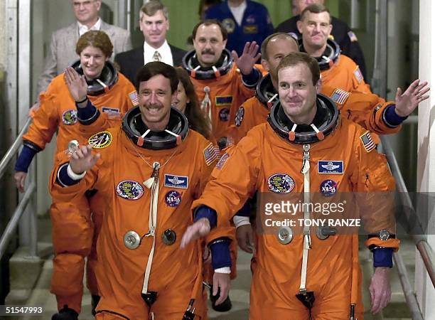 The Space Shuttle Atlantis crew Pilot Scott Horowitz, Commander James Halsell, Mission Specialist Mary Weber, Mission Specialist Jeffrey Williams,...