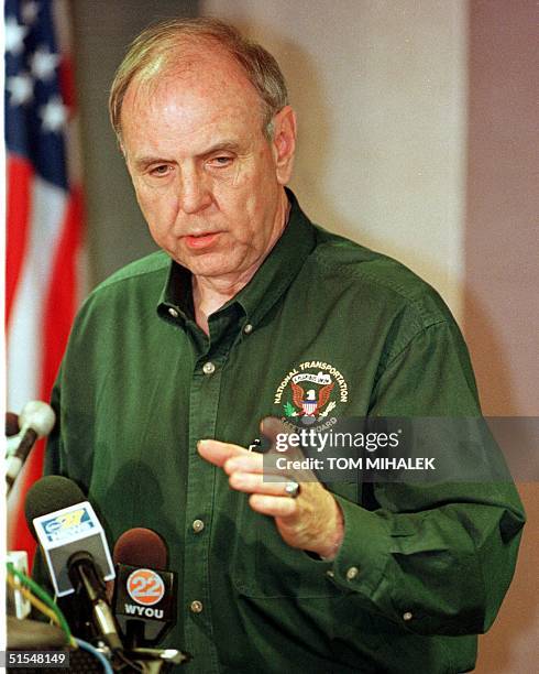 George Black, an investigator with the National Transportation Safety Board, answers a reporter's question during a press briefing 22 May in...