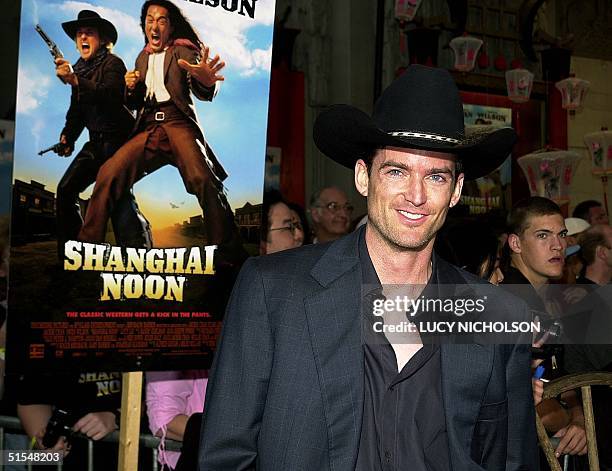 Director Tom Dey arrives at the premiere of his ne, News Photo