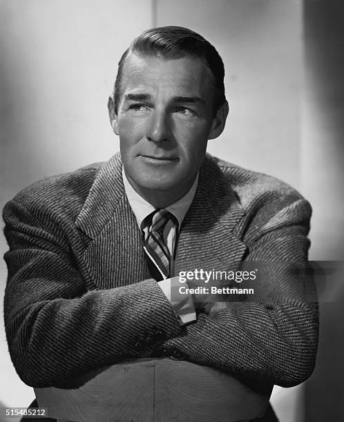 Randolph Scott. Latest portrait of rugged film hero, made during production of RKO Radio's big historical spectacle, Badman's Territory.