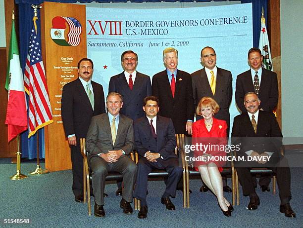 Governors gathered for a group photo at the start of the 18th Annual Border Governors Conference in Sacramento 01 June, 2000. Standing are Governors...