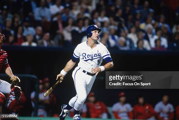 George Brett of the Kansas City Royals watches his ball fly and starts to run to first against the St. Louis Cardinals during the World Series at...