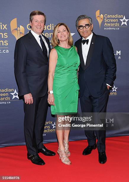 Toronto Mayor John Tory, Barbara Hackett and actor Eugene Levy arrive at the 2016 Canadian Screen Awards at the Sony Centre for the Performing Arts...