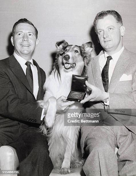 "Lassie," Douglas Edwards, and Art Carney receiving Peabody Award.