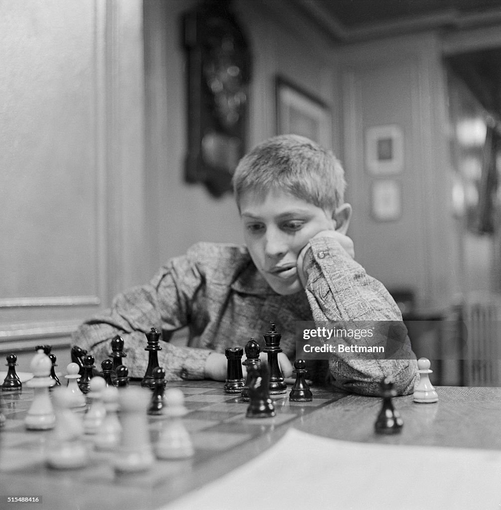 Bobby Fischer with One Hand on Jaw While Playing Chess
