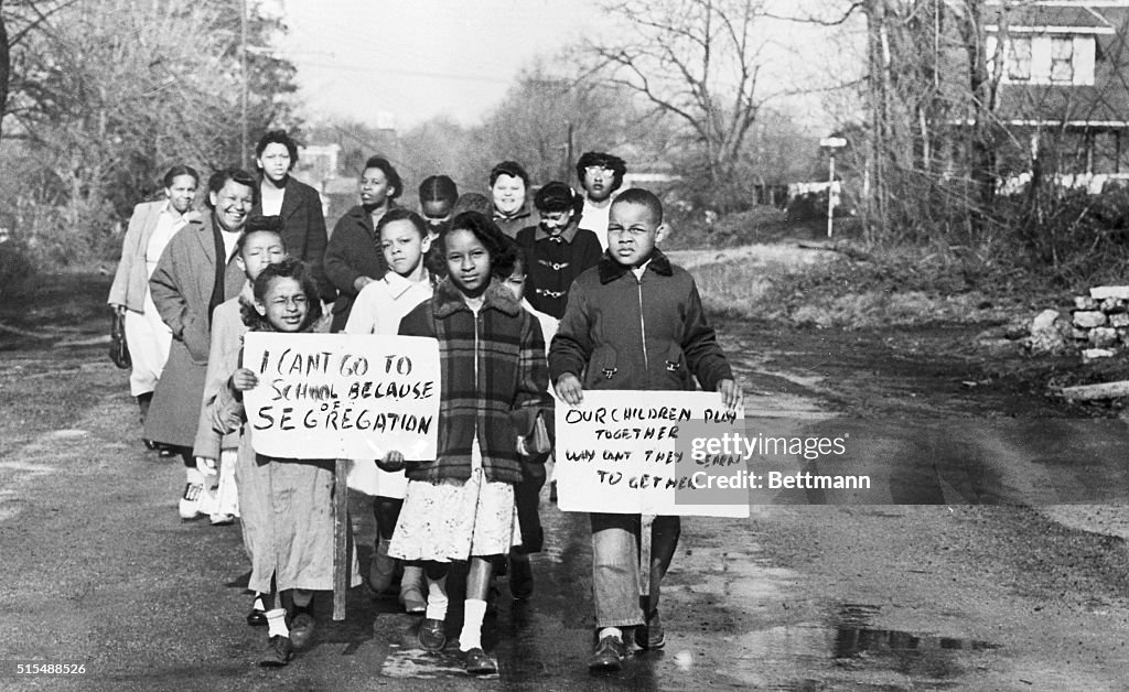 African American Children Marching with Signs Near Segregated School