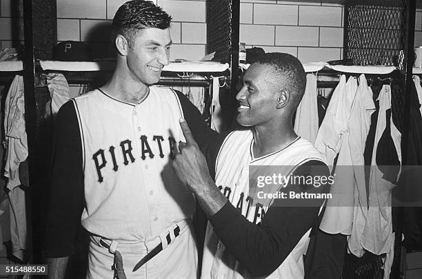 Roberto Clemente, Pittsburgh Pirates' right-fielder holds up one finger to show he is first in batting in the National League. Clemente got three...