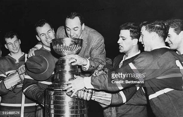 Freshman coach "Toe" Blake sips from the Stanley Cup and finds victory sweet April 10th after the Montreal Canadian's won a 3-1 victory over the...