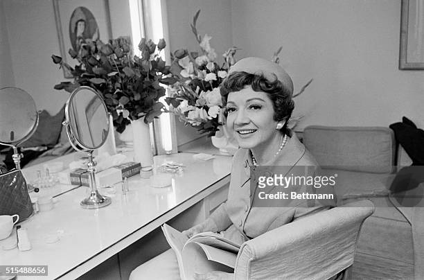 Shown in her Warner Bros. Dressing room during an interview actress Claudette Colbert said that American audiences are much harder to entertain...