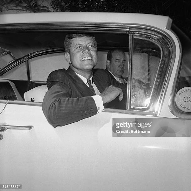 Presidential nominee Senator John Kennedy drives to Kennedy headquarters at the Biltmore Hotel the day after winning the first ballot at the...