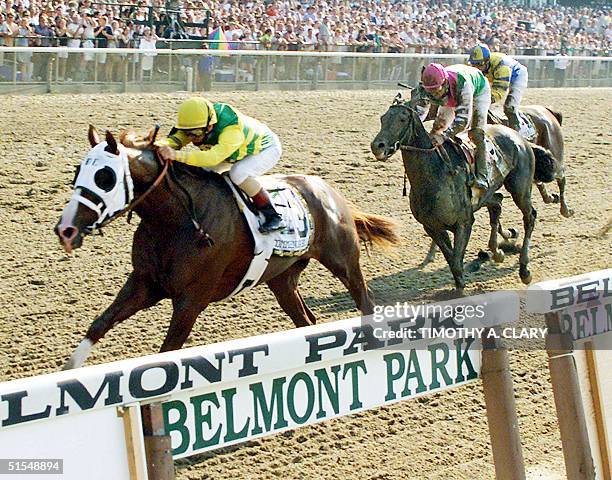 Jockey Pat Day rides Commendable past the finish line to win the 132nd running of the Belmont Stakes at Belmont Race Course 10 June, 2000 in Belmont,...